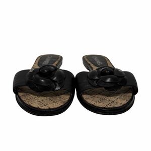 Chanel Solid Black Flower Leather Flats